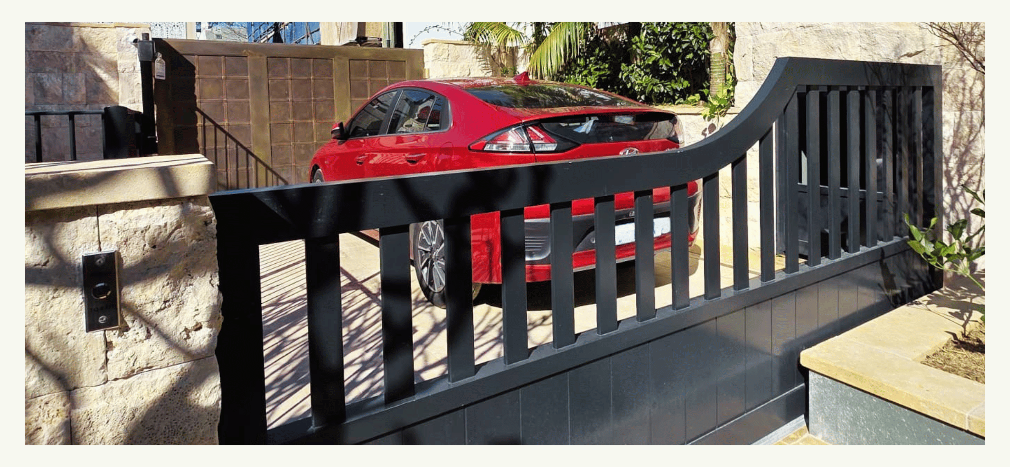 OMER Total Rex car lift integrated into heritage residence courtyard in Sydney